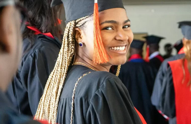 A young Black woman graduates from college